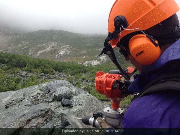 _Drilling a hole for a trail marker.